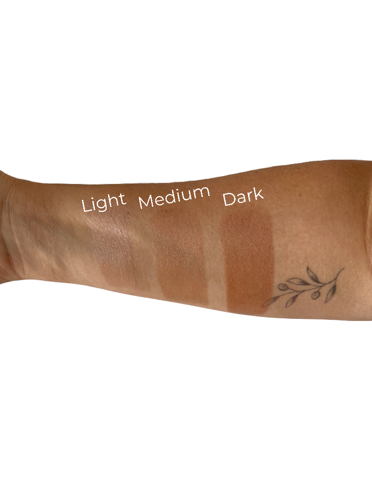 Three shades of natural face zinc displayed on arm for colour selection
