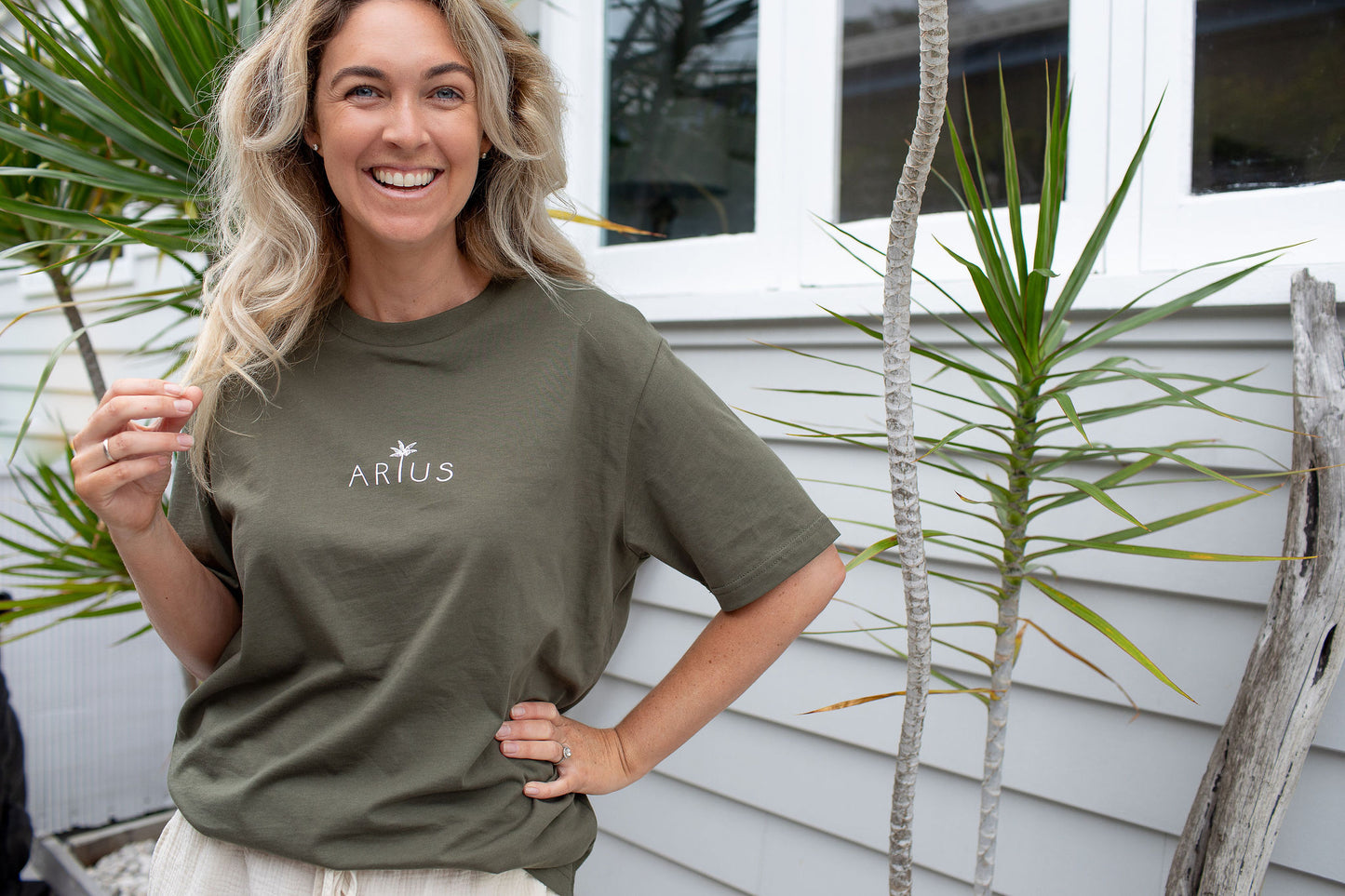 Woman smiling wearing organic cotton t-shirt