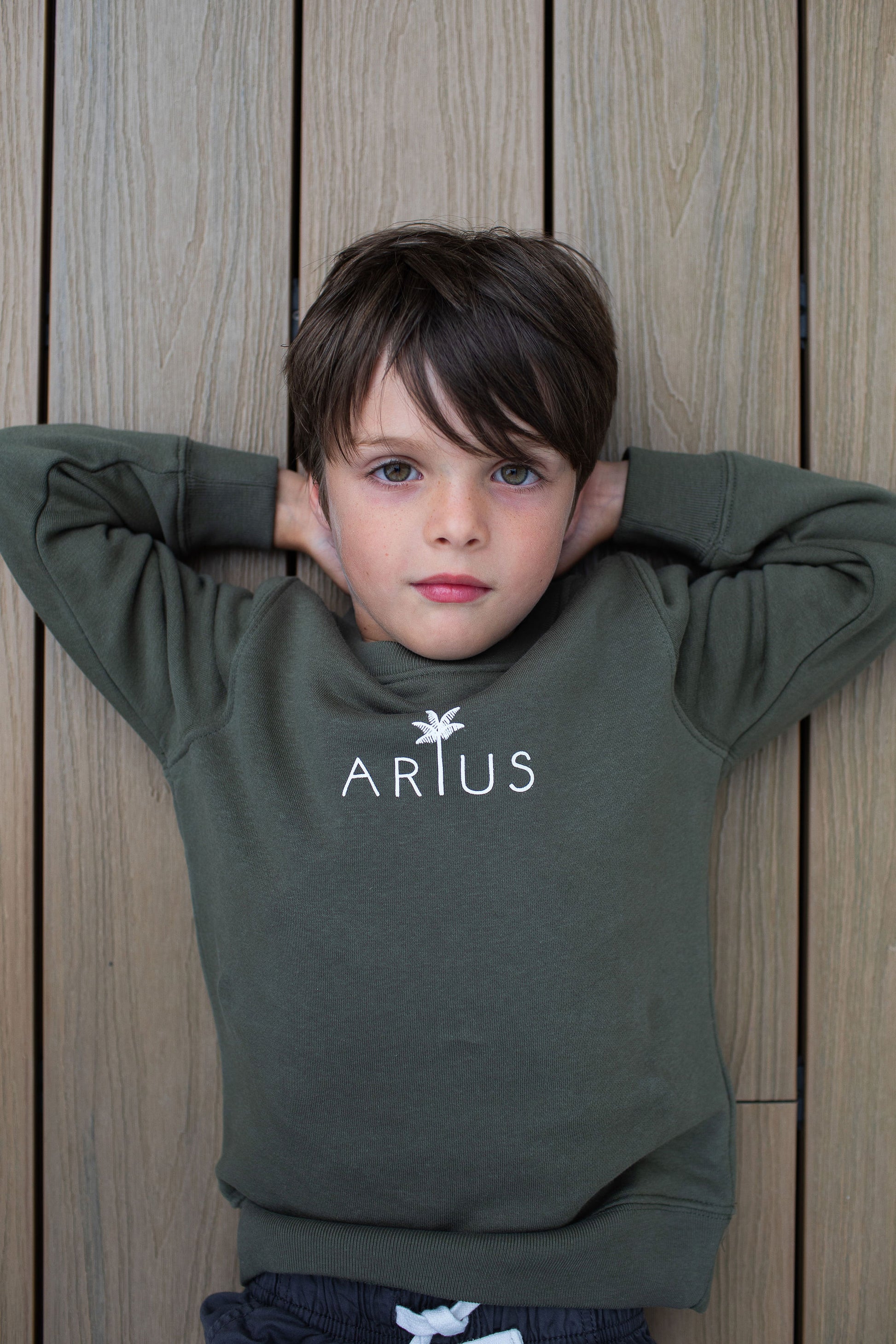 Organic cotton kids jumper ethically made with centred logo
